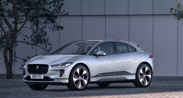Jaguar I-Pace electric car exterior front parked outside building